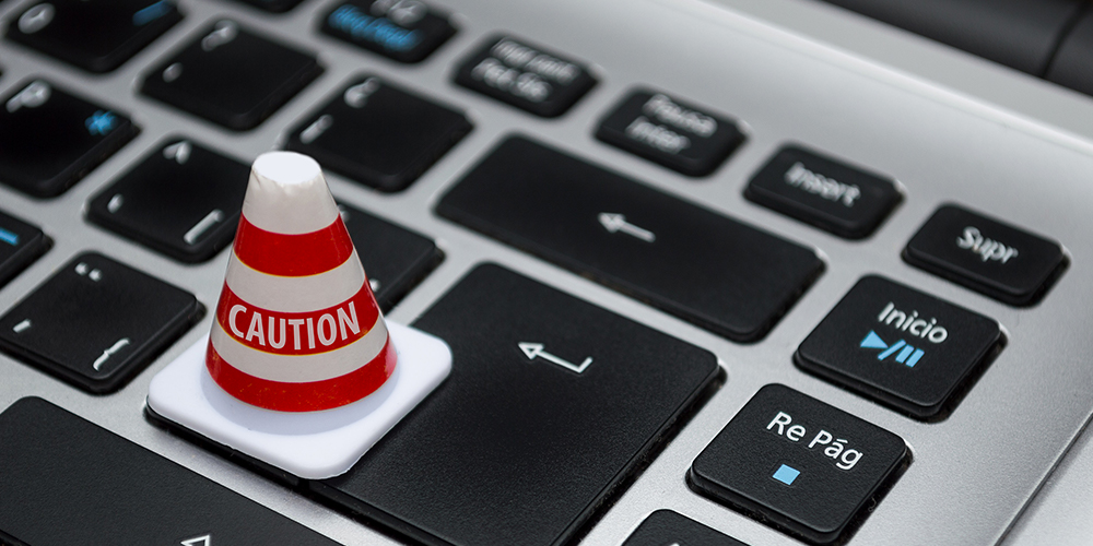 F2_1000X500_white-caution-cone-on-keyboard-2111511000×500